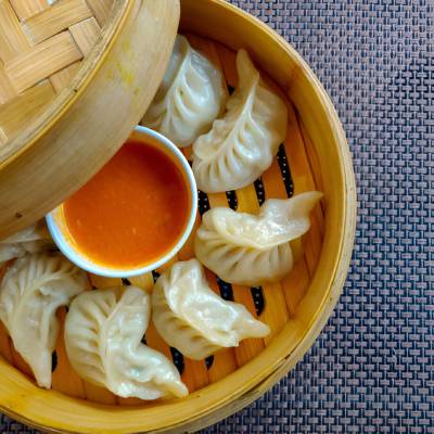 Plates of Nepali momo with chutney